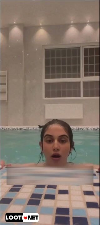 Teen Girl Dives Into Pool in Cute Swimsuit