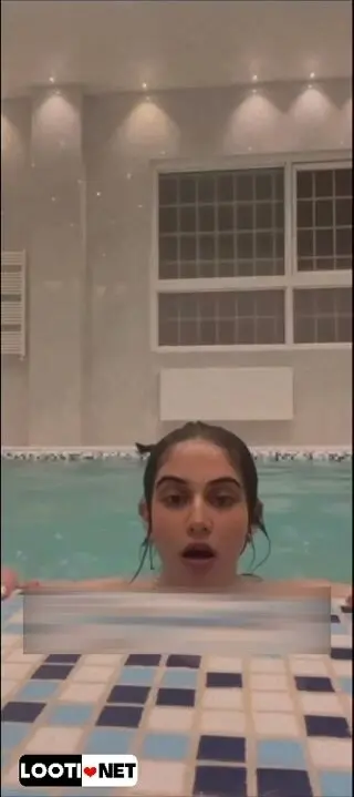 Teen Girl Dives Into Pool in Cute Swimsuit