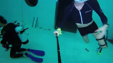 Asian Girl Plays Underwater in Stunning Swim Scene