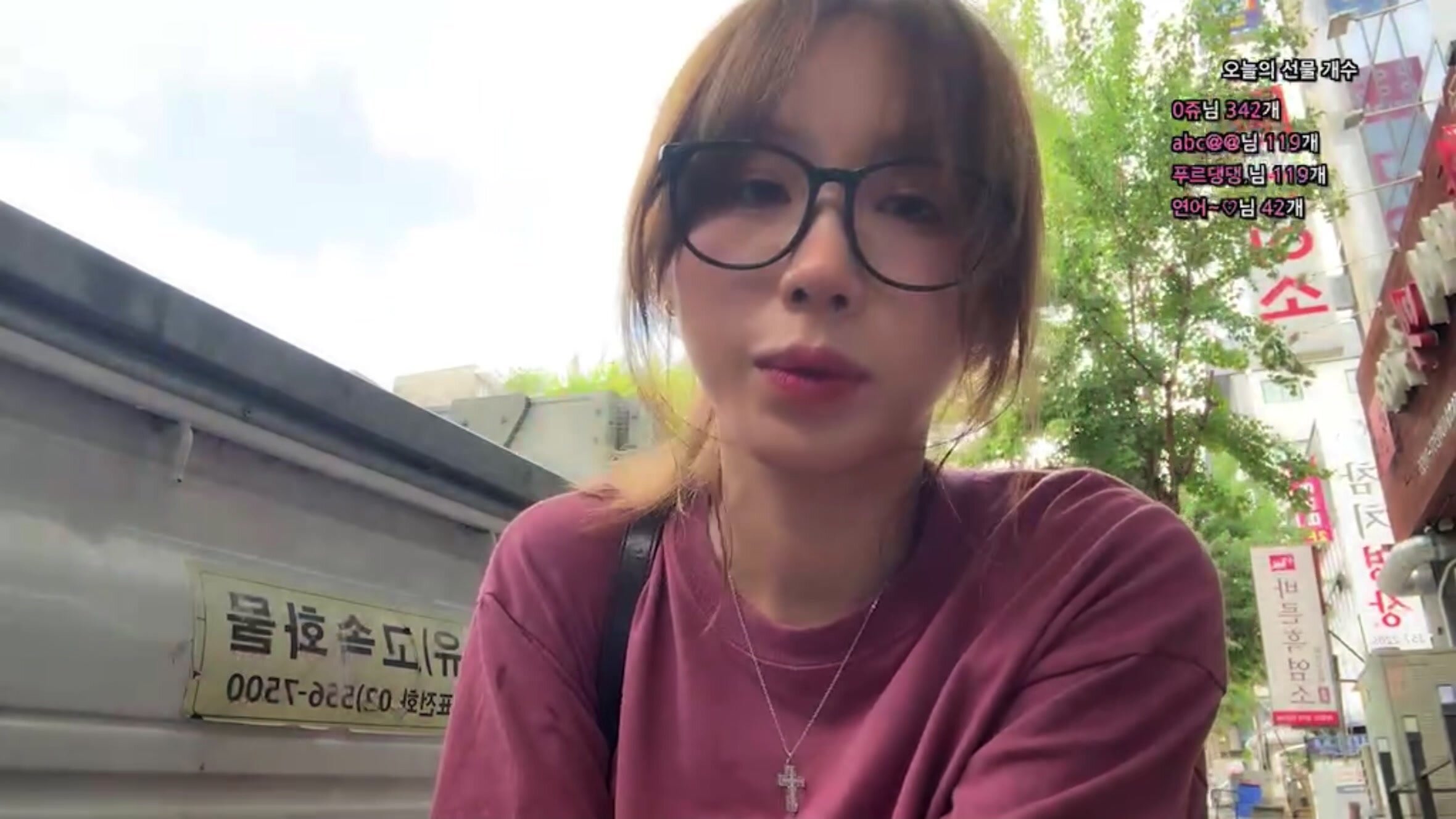 Korean Girl Smoking and Littering in Urban Setting