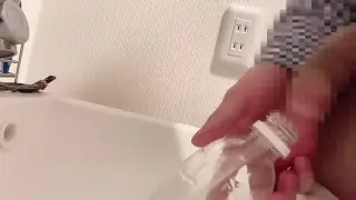 Hot Guy Pees Into Bottle from Side – 4K Asian Shower Scene